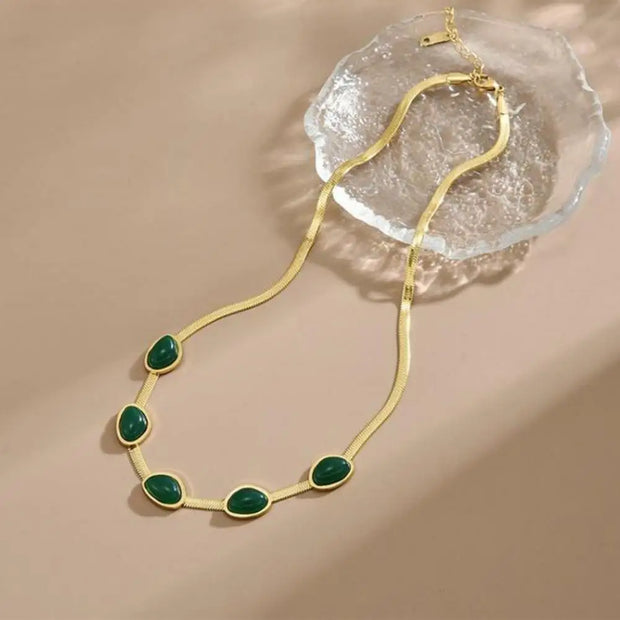ensemble de bijoux  et montre en émeraude sn
